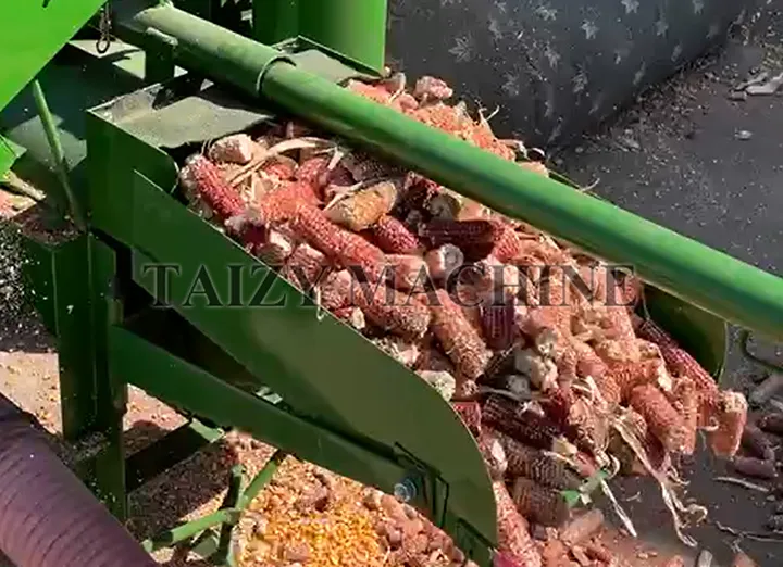 The corn cob outlet is used to automatically discharge empty corn cobs after the kernels have been removed. It ensures continuous machine operation, prevents clogging inside the machine, and makes waste collection more convenient and efficient.